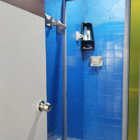 Compartida En Con Ac, Wifi, Uso De Cocina Yo Habitación en casa particular *